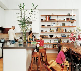 The Ogrodnik/Bardin family enjoy the pleasures of family life in the kitchen.