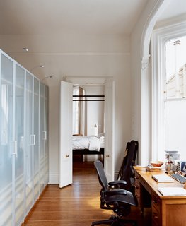 What was once a bathroom now serves as a walk-in closet and Nelson’s office. The closets are from IKEA.