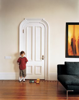 "In the living room," Nelson explains, "we fell in love with the nail patterns in the floor and asked our contractor, John Hakewill, to follow the original pattern to a T. The floor was so well done originally, all the woodworkers would come in here and they couldn’t stop talking about how they hadn’t seen such a great floor—ever."