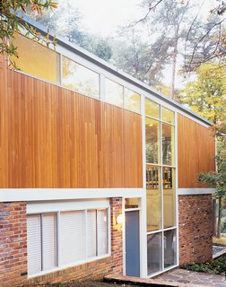 During the 2004 renovation the Wilsons replaced the plywood siding with cedar, and used reclaimed brick to maintain the home’s classic appearance.