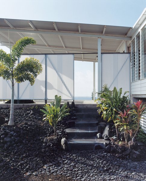 Go With the Flow - Photo 3 of 11 - The lava rock used for the steps was cut on a giant saw near Hilo. Craig finished assembling the staircase just in time for Zane’s one-year baby luau.