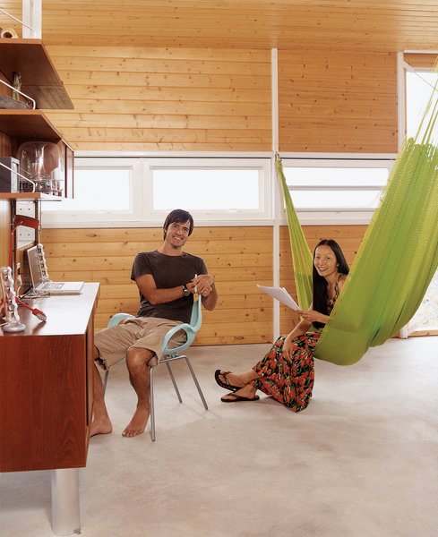 Go With the Flow - Photo 11 of 11 - A vintage suspended wall unit serves as a home office. Cathy demonstrates the "third bedroom"—a three-person hammock from Oaxaca.