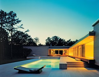 Seeing What Develops - Photo 2 of 5 - House 43’s modernist elevation is both monumental and inviting. These shots show the Hariri design in its spec stage, before the first residents, Heide Banks and Howard Lazar, moved in.