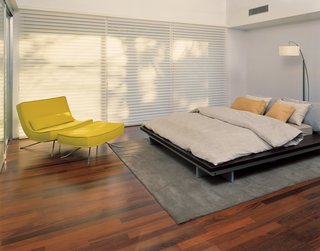 Seeing What Develops - Photo 4 of 5 - Blinds in the master bedroom provide privacy from the street.