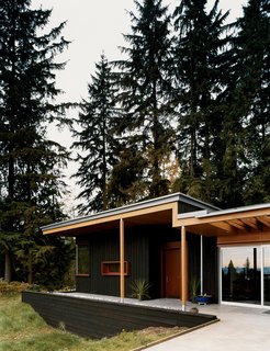 The rear patio features a smooth concrete deck.