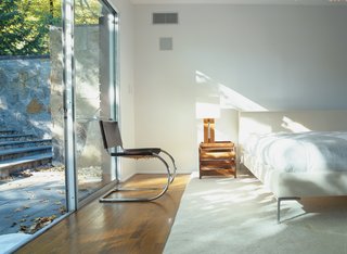 The master suite was fashioned from the house’s original garage in a 1970s renovation.