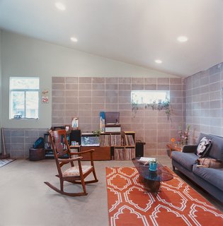 A carefully placed window illuminates the corner of the main living area.