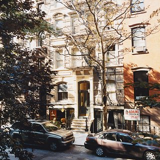 Milan Hughston's apartment is at the rear of a historic multi-unit building