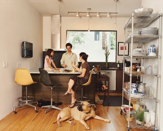 Inside the condos, the Fords’ penchant for rescuing and renewing is evident, from the many refugee animals that contentedly lounge about the house, to the salvaged gym floors in the kitchen.