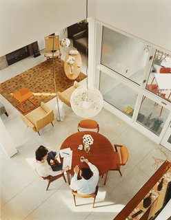 Instead of buying new furniture, Backus went in favor of re-use and outfitted the house almost entirely with eBay finds, with the exception of the Flos Arco floor lamp by Castiglioni and the Random light by Moooi. "I spent months online looking for the right pieces," he says. "It was fun sourcing the furniture myself."