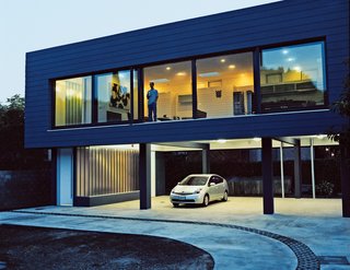 By raising the structure over the shaded parking area, the designers were able to provide additional cooling air from below, and eliminate the need for air-conditioning.