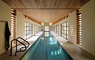 Skinny Dip - Photo 1 of 3 - Competitive swimmer Sydne Didier commissioned Austin Design Inc. to create a 102-foot-long pool house in a freestanding structure behind her Amherst, Massachusetts, house.