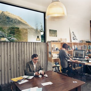 Kerr Ritchie Architects’ studio at the rear of the building opens onto a lawn on the lake side of the home. The form evolved during planning from a "modernist box" into a "strong, sculptural" frame.