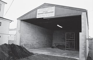 An outbuilding that belonged to the warehouse complex; today the same space holds the courtyard.