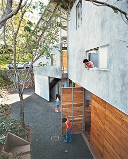 José Roberto looks down on the secluded courtyard, where Pilar and Patty open things up.