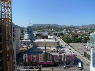 The W Hollywood Residences - Photo 3 of 10 - The north view from the 14th-floor unit. Capitol Records is to the left, and the Hollywood sign is at dead center.