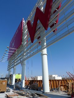 The W Hollywood Residences - Photo 6 of 10 - The rooftop residential pool, where the W signage will tower over sunbathers. The pool is being poured behind those wooden frames.