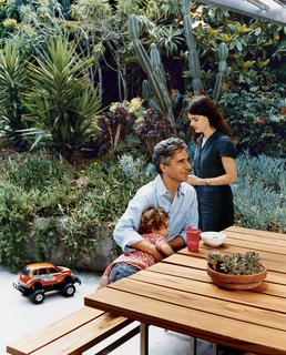Day, Hachigian, and Sosi congregate on the back terrace at a dining table designed by Day and his brother-in-law, Garo Hachigian.