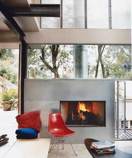 How This Couple Broke The Rules in a LA Suburb - Photo 4 of 9 - Galvanized steel was used to clad the fireplace.