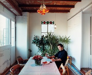 The couple took down a wall to create the open kitchen and lounge space where Tham and Hanna play. Wooden panels that aped a Swiss chalet also came down out of the "interior patio," making the dining room more palatable.