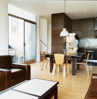 The dining chairs are Yolanda side chairs by Ukao.