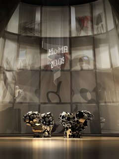 Rendering of the Ron Arad: No Discipline exhibition, featuring Lolita chandelier and Even the Odd Balls? chairs<br><br>Photo courtesy of <br><br>Ron Arad Associates and the Museum of Modern Art