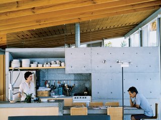 Sold in some of Mexico’s larger cities (Mexico City and Guadalajara), as well as in New York and Paris, Bernardo Gomez-Pimienta's design line, BGP, is perfectly sampled at the house in Valle de Bravo. Because the kitchen, dining area, and living room are a single space where Gomez-Pimienta kept materials minimal, the individual forms of the objects stand out. The Casa Ia tableware is that of the Habita Hotel; Java chairs surround the cantilevered concrete dining table; Attu armchairs welcome peaceful moments in the living room. Even the outdoor furniture is meticulously designed: "The easy chairs have a somewhat industrial structure due to the stainless steel, but the knitted plastic gives them a soft and gentle gesture," he says.