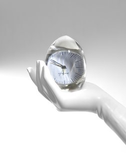 Dada clock, also available in gold and aqua, by Artecnica