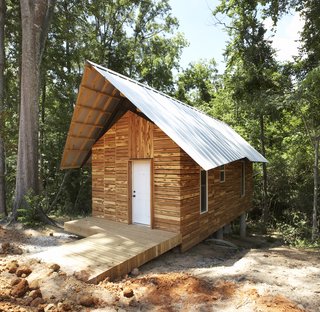 In 2008, students Drew Coshow, Robert Douge, Abigail Grubb, and Steven Ward designed the Pattern Book House. The name was inspired by pattern books that were popular in the 1800s and outlined how to build design details, from columns to cornices. With such a book in hand, any construction worker equipped with basic building skills could construct facades straight out of ancient Rome or Greece, which were the styles most often offered in these publications. Similarly, the eventual goal of the $20K House program is that a small team of builders with printouts of one of the $20K House plans will be able to build a home in a few days without any additional assistance or instruction.<br><br>Photo by <br><br>Ty Cole