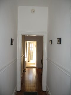 Noe Valley Renovation - Photo 8 of 17 - Before the renovation, the house was composed of dark, discreet rooms that lacked connection to one another or the exterior. The view here is from the front door toward the back of the house.<br><br>Photo courtesy of Samaha + Hart Architecture