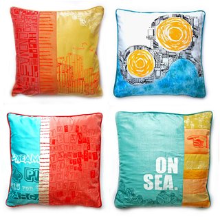 A collection of pillows created from reclaimed silk from old dresses and screened with Murphy's seaside-inspired designs.