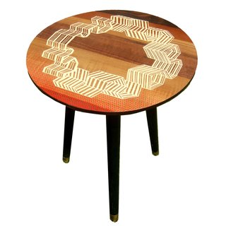 The Windbreaker Table, with a hand-veneered design of seaside windbreakers situated in a circle formation.