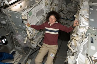 NASA astronaut Nicole Stott, Expedition 20 flight engineer, is pictured in the Leonardo Multi-Purpose Logistics Module (MPLM), temporarily attached to the ISS while Space Shuttle Discovery (STS-128) remains docked with the station. Photo taken September 5, 2009. Image courtesy of NASA.