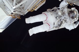 Astronaut Nicole Stott, Expedition 20 flight engineer, participates in the STS-128 mission's first session of extravehicular activity (EVA) as construction and maintenance continue on the ISS. During the six-hour, 35-minute spacewalk, Stott and astronaut John "Danny" Olivas (out of frame), mission specialist, removed an empty ammonia tank from the station's truss and temporarily stowed it on the station's robotic arm. Olivas and Stott also retrieved the European Technology Exposure Facility (EuTEF) and Materials International Space Station Experiment (MISSE) from the Columbus laboratory module and installed them on Discovery's payload bay for return. Photo taken September 1, 2009. Image courtesy of NASA.