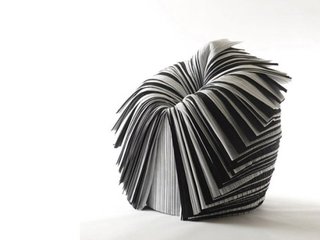 Nendo designed the Cabbage Chair for the XXIst Century Man exhibition curated by Issey Miyake in 2008. The piece is made of pleated paper created as a by-product during fabric production. The material would ordinarily be discarded.