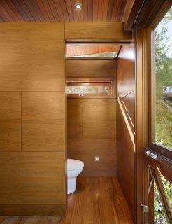 An Atypical Tree House - Photo 6 of 11 - The tree house serves also as temporary guest quarters, with modern-day amenities like a daybed, a sink, a toilet, a small refrigerator, a fireplace and a microwave.