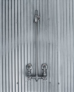 Farm Fresh - Photo 6 of 10 - A simple shower design using corrugated steel references farmhouses of old.