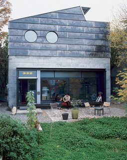 Even in ever-gray and gloomy Seattle, the 24-by-10-foot front window lets in enough light that the couple rarely needs to turn on any lamps inside the house.