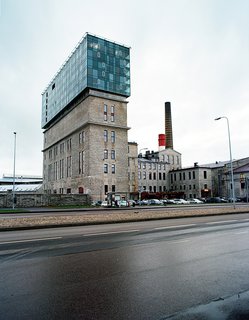As a symbol of Tallinn’s architectural rebirth, the Fahle House by local firm KOKO is deliberately conspicuous, thanks to the glass apartment box perched like a parasite atop the old limestone structure.