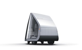 The pair deliberately forewent windows in the front and back of the vehicle to accentuate the notion of driverless driving.