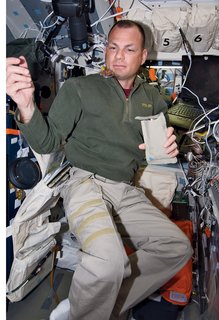 Dinner, however, has fewer rules and playing with food is permissible, as Tony Antonelli displays. Image courtesy of NASA.