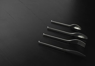 Kilo Design + BIG + Skibsted Ideation - Photo 3 of 15 - Oki Cutlery by KiBiSi. Designed in 2007 to combine the idea of a chopstick rest ("hashi oki") with Scandinavian cutlery design so the ends of the forks, spoons, and knives never touch the tabletop. In prototyping phase.<br><br>Photo courtesy of KiBiSi