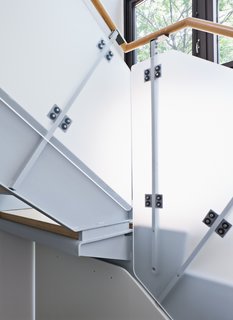 A detail shot of the stair, which spirals up and down throughout the house.