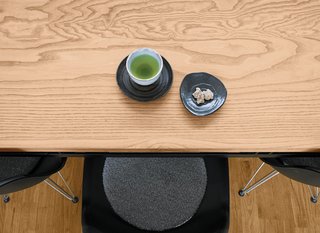 Green tea and a sweet for a guest.