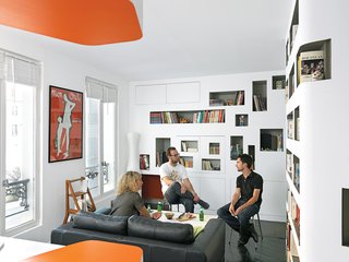 The living room is cozy, but large enough to seat a few friends.