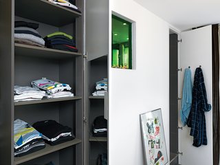 The largest appliances are clustered around the apartment’s plumbing core, which abuts the kitchen and bathroom.