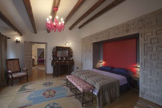 La Bodega has six guest bedrooms furnished with pieces from the owner's personal antique collection.