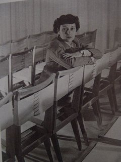 Lina Bo Bardi - Photo 1 of 14 - The architect with her side chair designs, year unknown. Photo courtesy Espasso.