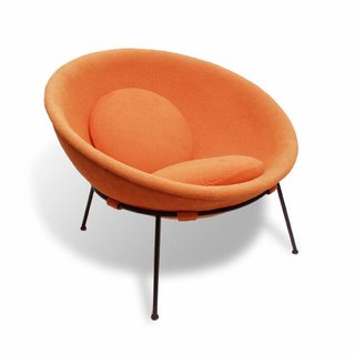 Lina Bo Bardi - Photo 12 of 14 - Bo Bardi’s Bowl chair, designed in 1951 of iron and aluminum, with orange fabric.
