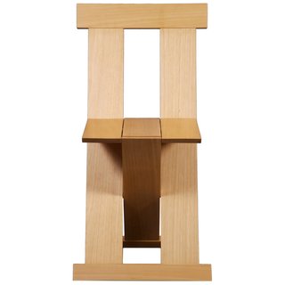 Lina Bo Bardi - Photo 14 of 14 - The folding Frei Egídio chair, which Bo Bardi designed with the architects Marcelo Ferraz and Marcelo Suzuki, was modeled after the lines of a 15th-century Franciscan chair. Shown is a contemporary version, manufactured in 2005.